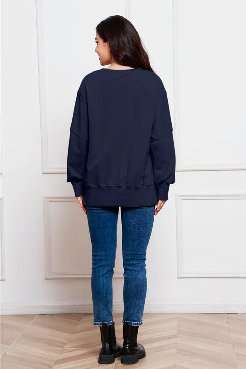 Exposed Seam Long Sleeve Slit Sweatshirt