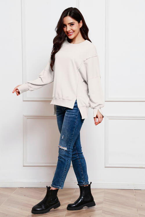 Exposed Seam Long Sleeve Slit Sweatshirt