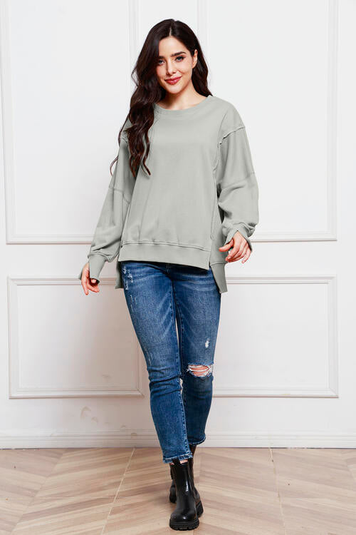 Exposed Seam Long Sleeve Slit Sweatshirt