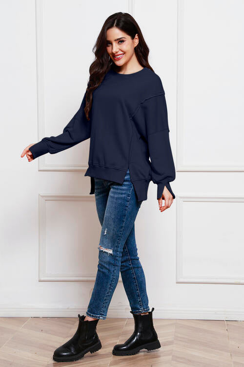 Exposed Seam Long Sleeve Slit Sweatshirt