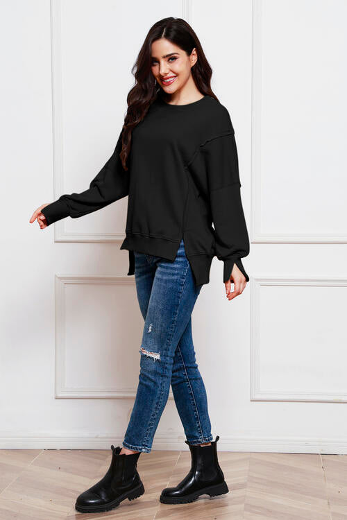 Exposed Seam Long Sleeve Slit Sweatshirt