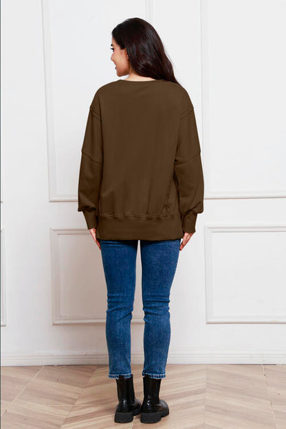 Exposed Seam Long Sleeve Slit Sweatshirt