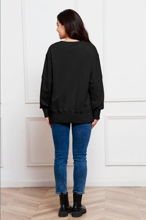 Exposed Seam Long Sleeve Slit Sweatshirt