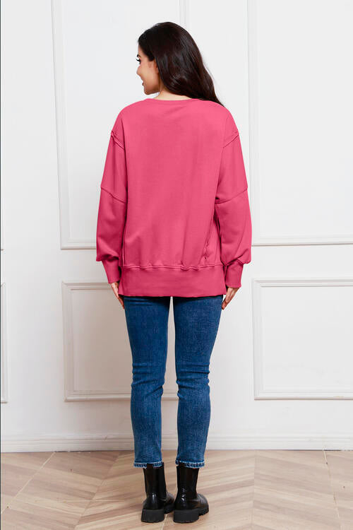 Exposed Seam Long Sleeve Slit Sweatshirt