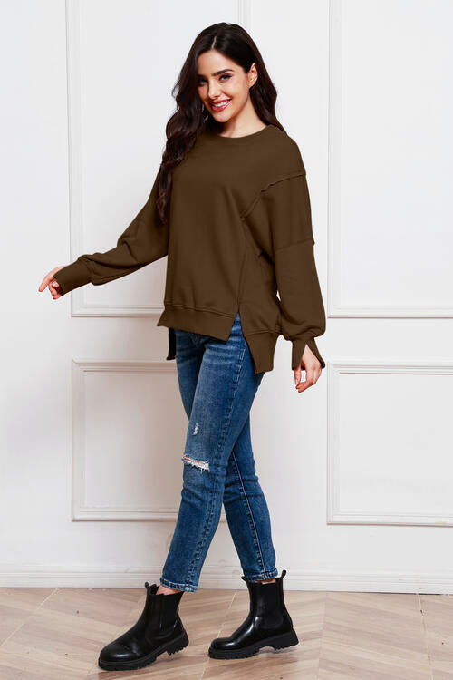 Exposed Seam Long Sleeve Slit Sweatshirt