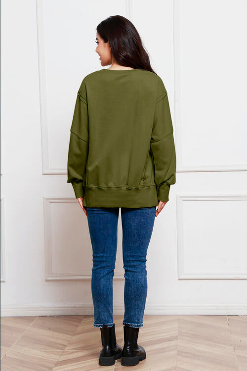 Exposed Seam Long Sleeve Slit Sweatshirt