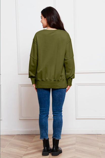 Exposed Seam Long Sleeve Slit Sweatshirt